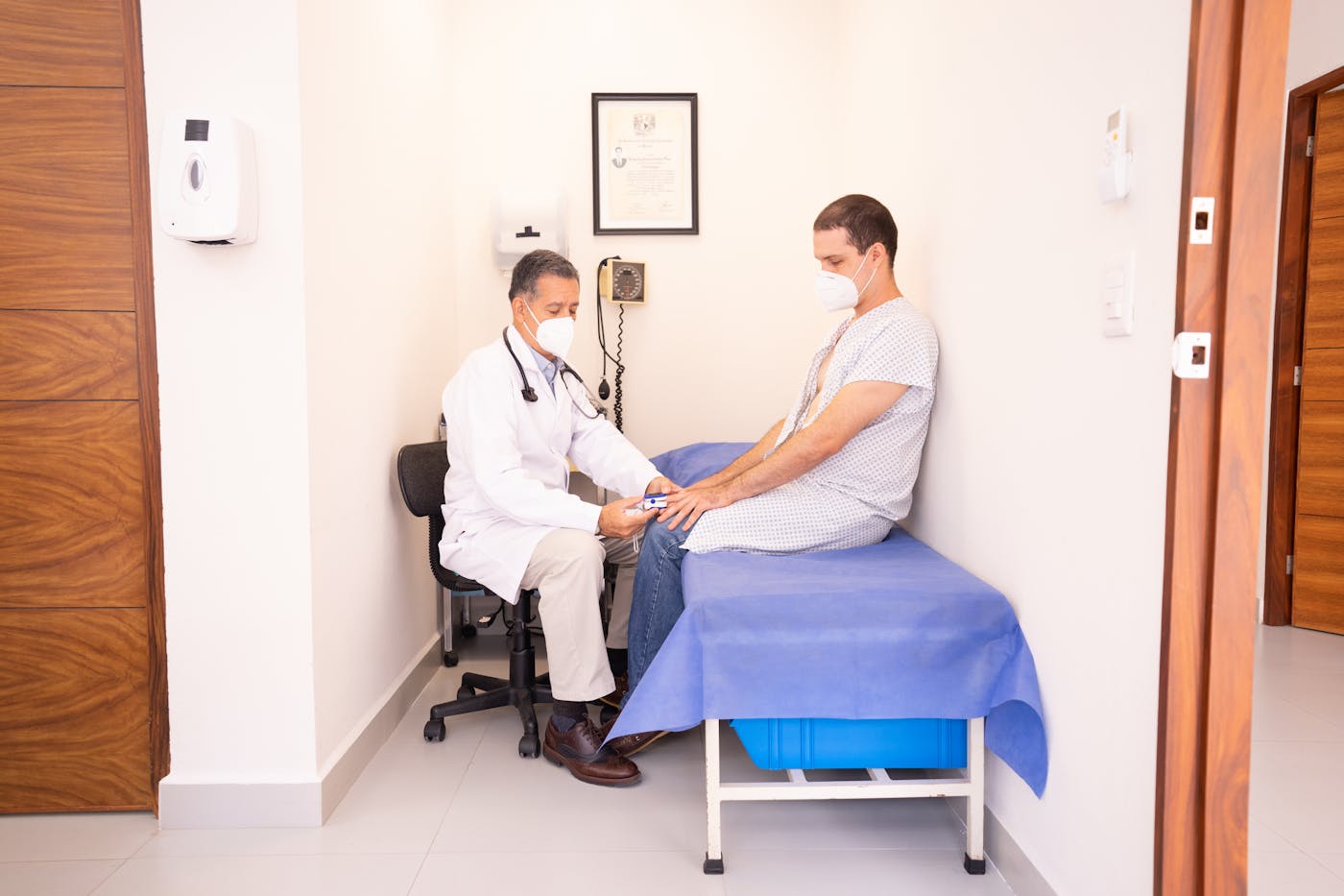 Clean, modern clinic exam room with professional equipment